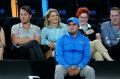 Singer Natalie Bassingthwaite (second from left) sitting on court for the match between Serena Williams and Lucie ...