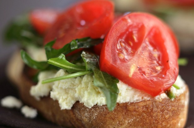 Ricotta (flavoured with extra-virgin olive oil & parmesan) on toast with tomatoes & rocket. <a ...