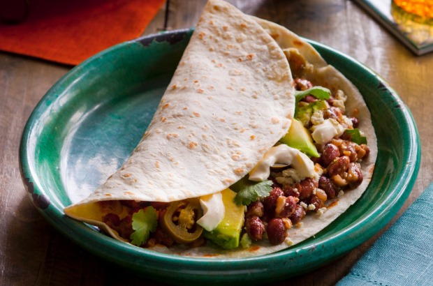 Breakfast baleadas with red beans, avo and feta. <a ...