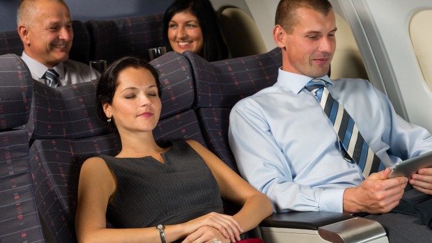 It's not hard to ask the person behind you before reclining your seat.