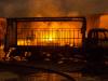 Crews contain suspicious factory fire