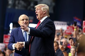 Republican presidential candidate Donald Trump arrives to speak at a campaign rally in Akron, Ohio, Monday, Aug. 22, 2016.