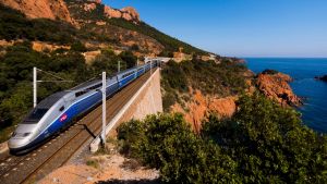 Anth?or, France, September 27, 2014 : A french high speed train TGV running over a viaduct alongside mediterranean ...