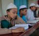 Bangladeshi Muslim students read the holy Quran at an Islamic school during Ramadan in Dhaka, Bangladesh in June 2016. 