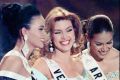 Alicia Machado (centre) at the 1996 Miss Universe pageant, where she was crowned the winner.