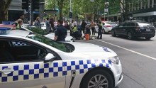 Police and emergency services at the scene after a car is believed to have hit pedestrians in Bourke Street Mall in Melbourne, Friday, Jan. 20, 2017.