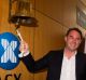 John McGrath in happier times, ringing the bell as his real estate company floated on the ASX. 