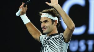 Roger Federer celebrates with the crowd  after his victory.