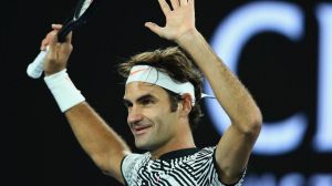 Roger Federer celebrates with the crowd  after his victory.