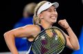 Australia's Daria Gavrilova celebrates after defeating Switzerland's Timea Bacsinszky in their third round match.