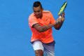 Met with boos: Nick Kyrgios on his way to a straight sets Hopman Cup loss to Jack Sock in Perth last week.