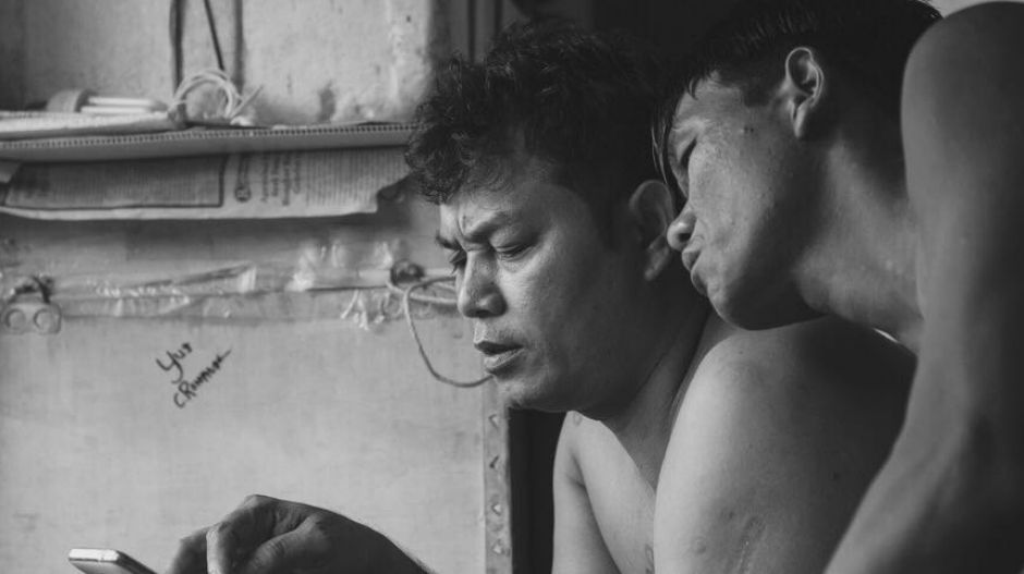 Victims of human trafficking in the  fishing industry pictured waiting for their back pay in  Ambon, Indonesia. 