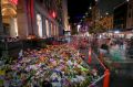 Floral tribute at Bourke Street Mall on Sunday night. 