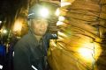 A worker in a mine in China operated by Yanzhou Coal. Yancoal, owned by Yanzhou, is buying Rio coal mines in NSW.