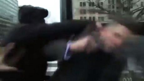 White nationalist Richard Spencer punched in face by protester during interview (Photo Courtesy of @TheeCurrentYear/Twitter)