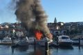 A boat has burst into flames at Mindarie Marina.