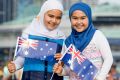 The billboard featuring two Muslim Australian girls was removed  in Melbourne following complaints from some constituents.
