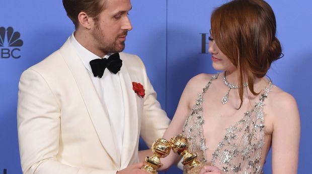 Ryan Gosling and Emma Stone after winning Golden Globes for <i>La La Land</i>, which received 14 Oscar nominations.