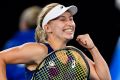 Australia's Daria Gavrilova celebrates after defeating Switzerland's Timea Bacsinszky in their third round match at the ...