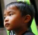 Mattea Twinn marches with her 3-year-old son, Khalil Khang in downtown Chicago in solidarity with the tribes fighting to ...