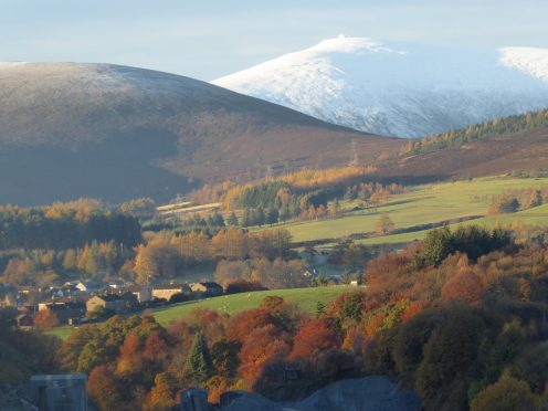 Snowy Ben Rinnes
in early morning
sunshine, with
Dufftown in the
foreground.
Photograph: Bill
Morrison, Huntly