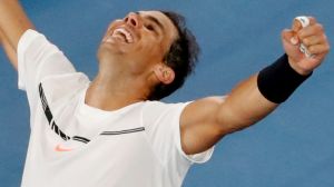 Spain's Rafael Nadal celebrates after defeating Canada's Milos Raonic during their quarterfinal at the Australian Open ...