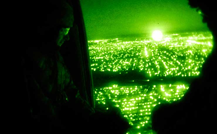 An American chopper patrols over the skies of Baghdad. (DVIDSHUB, Flickr)