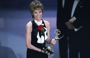 Mary Tyler Moore, 56, accepts the Emmy for best supporting actress in a miniseries or special for her role in “Stolen Babies” during the 45th annual Emmy Awards in Pasadena, California, Sunday, Sept. 19, 1993.