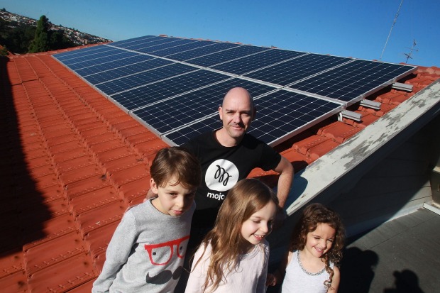 SYDNEY, AUSTRALIA - JUNE 13:  Darren Miller - pictured with Emily, Jonah and Lucy - installed batteries and a smart ...