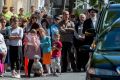 Mourners gather over the Bourke Street death of 10 year old Thalia Hakin