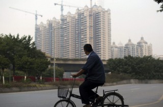 China Bond Rating Co estimates property sales volume may suffer a "substantial decline" this year.
 