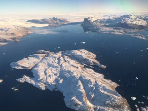 File - An island at the mouth of Upernavik Glacier on the northwest coast of Greenland, photographed during the September 2016 field campaign of Oceans Melting Greenland.