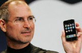 Apple CEO Steve Jobs demonstrates the then new iPhone during his keynote address at MacWorld Conference & Expo in San ...