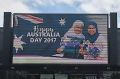 Online threats were made against the Canberra Theatre Centre digital billboard for showing an image of two Muslim ...