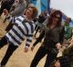 Tilda rocking out on the dancefloor at Rainbow Serpent Festival with her daughter-in-law Michelle and grandson Kaelan.