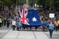 The crowd on Swanston Street for the Australia Day parade. 