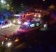 Emergency services take a woman who was injured in the attack to hospital on Tuesday night. A man was set alight at a ...