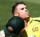 ADELAIDE, AUSTRALIA - JANUARY 26: David Warner of Australia celebrates after reaching 100 runs during game five of the ...