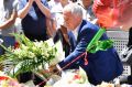 Malcolm Turnbull lays flowers in Bourke Street.