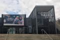 Online threats were made against the Canberra Theatre Centre digital billboard for showing an image of two Muslim ...