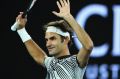 Roger Federer celebrates with the crowd  after his victory.