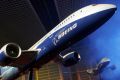 A model of a Boeing 787 "Dreamliner" is seen at a Boeing news conference in Paris, France, Thursday, April 27, 2006. ...