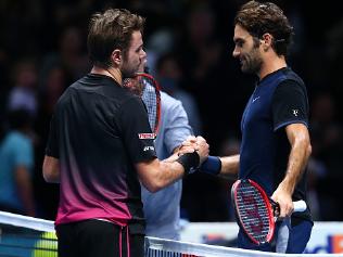 LONDON, ENGLAND - NOVEMBER 21: Roger Federer of Switzerland shakes hands with Stanislas Wawrinka of Switzerland after his victory in their men's semi final on day seven of the Barclays ATP World Tour Finals at the O2 Arena on November 21, 2015 in London, England. (Photo by Clive Brunskill/Getty Images)