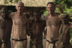 Australian film-makers Martin Butler (second left) and Bentley Dean (fourth left) with members of the Yakal tribe (from ...