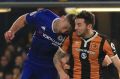 Ryan Mason of Hull City and Gary Cahill of Chelsea collide.