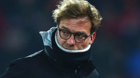 Liverpool's head coach Juergen Klopp leaves the pitch before kick off in the English League Cup semifinal 2nd leg soccer ...