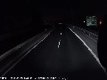 Car Narrowly Avoids Hitting Man in Highway