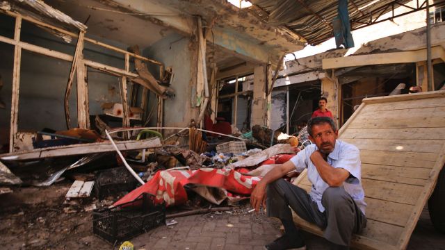 Locals inspect damage in parts of the historic district of  Diyarbakir last May.