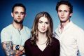 Canberra actors Lucy Lovegrove (centre) and Lukas Whiting (right) with their on-screen brother played by Luke Patrick.