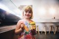 Zoe Doerr, of Watson, loved the Vegemite ice cream but her mum US-born Veronica, who earlier in the day became an ...
